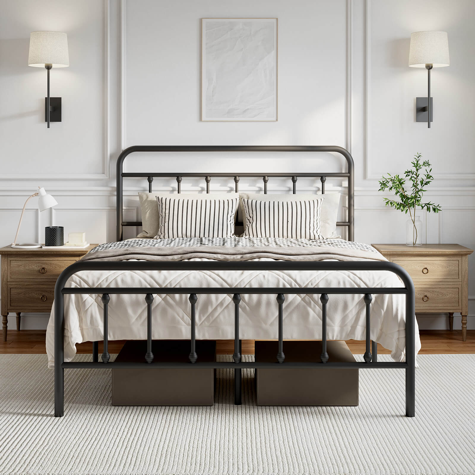 A black metal bed frame with under-bed storage, set in a bright, modern bedroom with white walls and wooden nightstands