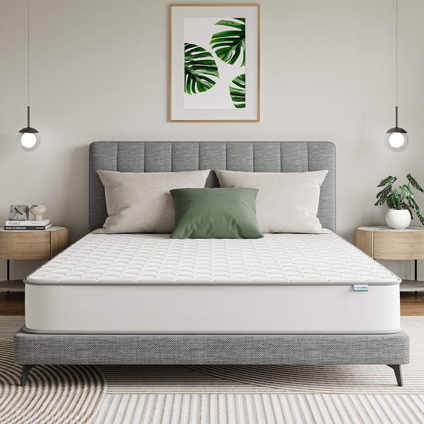 Berin Memory Foam Pocket Sprung Mattress with quilted top on grey bed frame in modern bedroom.