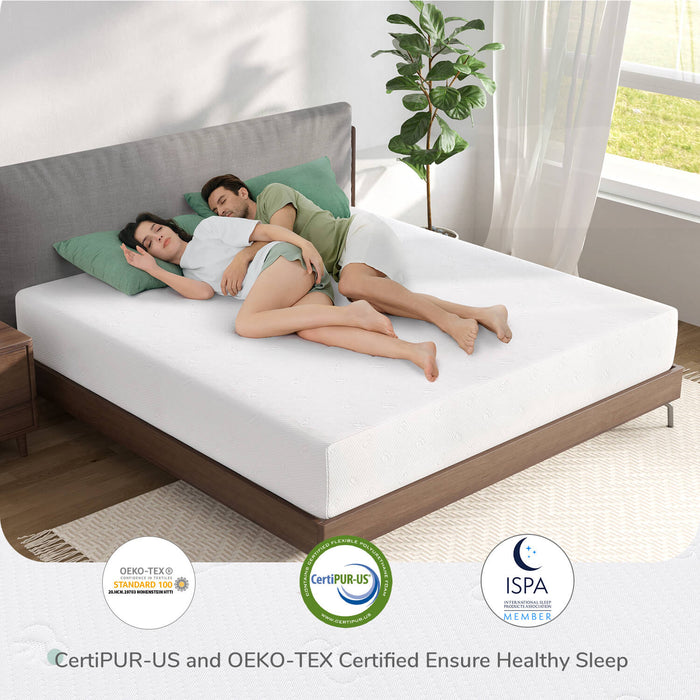 Couple sleeping on Quietude memory foam mattress with green pillows in a modern bedroom.