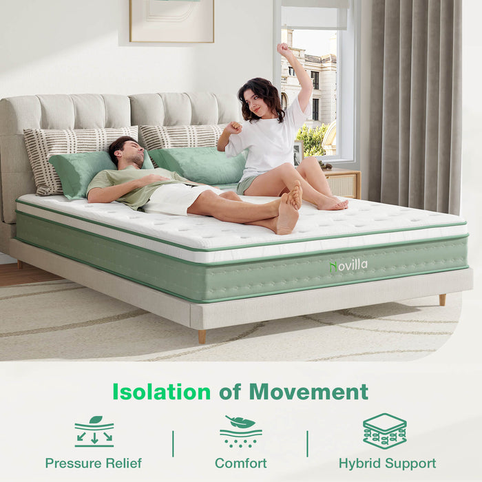Oasis Hybrid Mattress: Couple rests, showing motion isolation. White quilted top, green sides, Novilla logo.